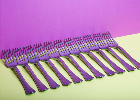 Tiivistelmä asetelma haarukoilla värikkäällä taustalla | Canvastaulut